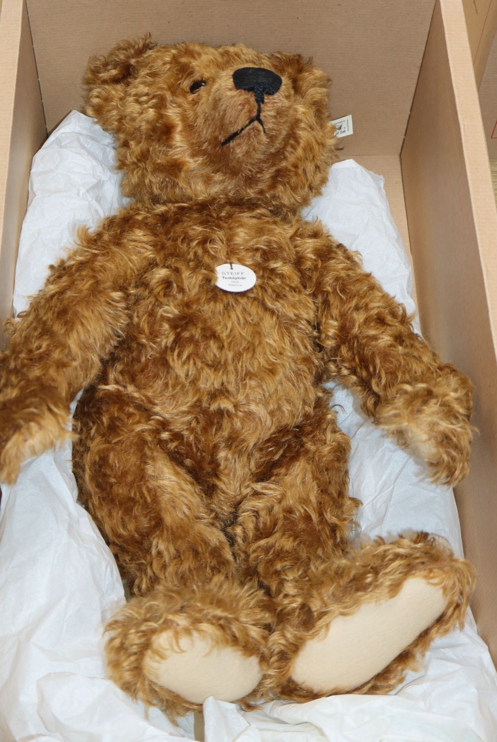 A Steiff replica 1997 teddy red brown boxed with certificate